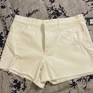 Brand new!  White distressed denim shorts.